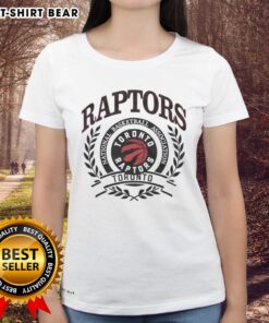 Vintage Toronto Raptors logo in a laurel wreath frame on a ladies' tee, perfect for NBA fans and retro apparel lovers.