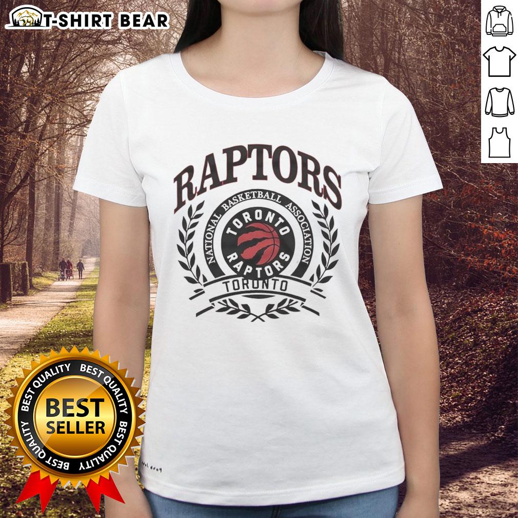 Nice Toronto Raptors National Basketball Association Logo Laurel Wreath Frame Retro Ladies-Tee Vintage Toronto Raptors logo in a laurel wreath frame on a ladies' tee, perfect for NBA fans and retro apparel lovers.