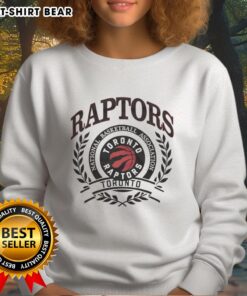 Alt Text: Retro Toronto Raptors sweatshirt featuring the NBA logo framed by a laurel wreath design. Perfect for fans!