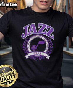 Alt Text: Stylish Utah Jazz NBA crest t-shirt featuring team colors and logo for fans of the National Basketball Association.