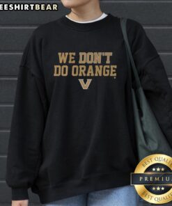 Nice Vanderbilt Commodores 'We Don't Do Orange' sweatshirt in black, showcasing team spirit and unique style.