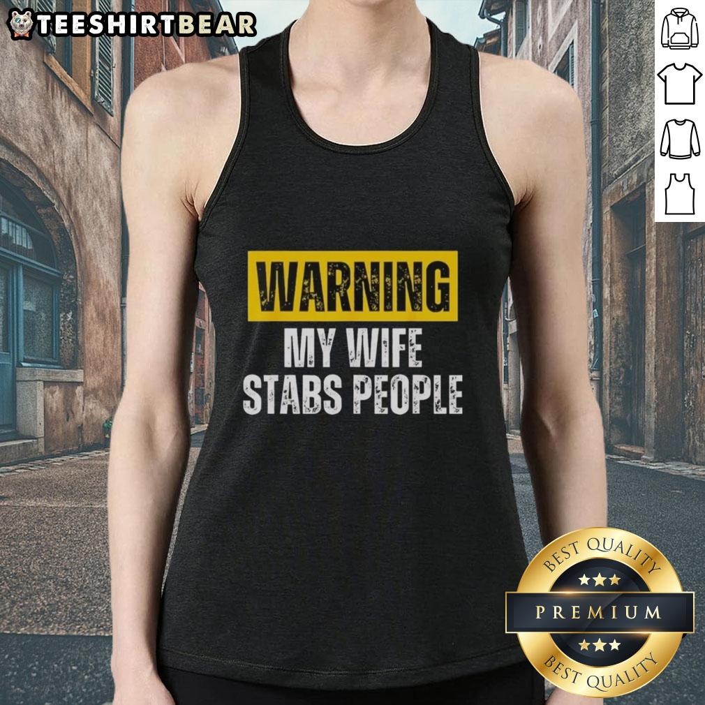 nice-warning-my-wife-stabs-people-vintage-tank-top Vintage tank top featuring a humorous warning: 'My Wife Stabs People' perfect for edgy fashion lovers.