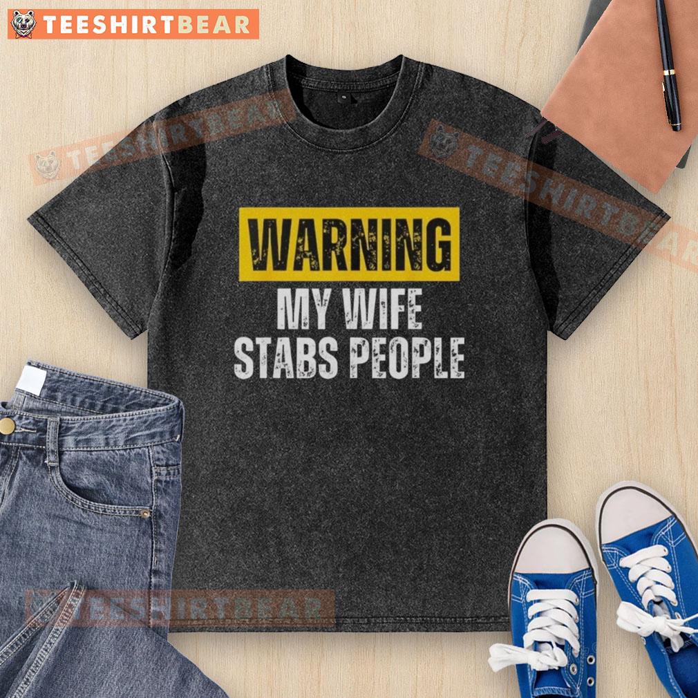 nice-warning-my-wife-stabs-people-vintage-washed-t-shirt Vintage washed t-shirt featuring a humorous warning 'My Wife Stabs People' design, perfect for casual wear and gifts.