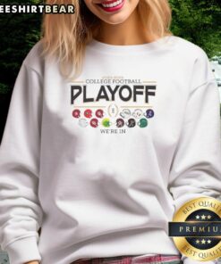 Alt Text: Nice We're In 12 Team Football Helmet CFP Logo Sweatshirt showcasing a stylish design for college football fans.