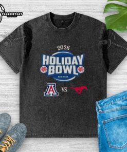 Official Arizona Wildcats vs SMU Mustangs 2026 Holiday Bowl matchup washed t-shirt featuring team logos and vibrant colors.
