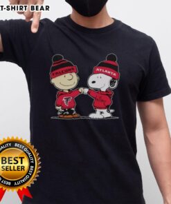Official Atlanta Falcons Snoopy and Charlie Brown Best Friends T-Shirt featuring iconic characters in team colors.