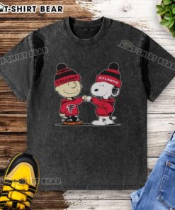 Alt Text: Official Atlanta Falcons Snoopy and Charlie Brown Best Friends washed t-shirt featuring vibrant graphics and team colors.