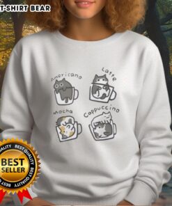 Cute sweatshirt featuring an official Cat-Puccino design with playful cats enjoying coffee, perfect for feline lovers.