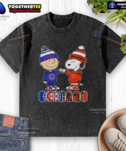 Official Charlie Brown fist bump with Snoopy on a washed T-shirt celebrating Chicago Cubs and Bears city sports.
