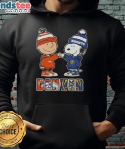 Official Charlie Brown fist bump with Snoopy in Denver City Sports Broncos X Nuggets hoodie, perfect for fans.