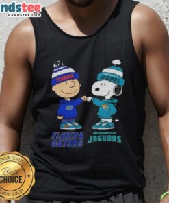 Official Charlie Brown fist bump with Snoopy on Florida Gators x Jacksonville Jaguars tank top design.