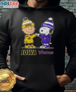 Official Charlie Brown fist bump hoodie featuring Snoopy, Iowa Hawkeyes, and Minnesota Vikings logos.