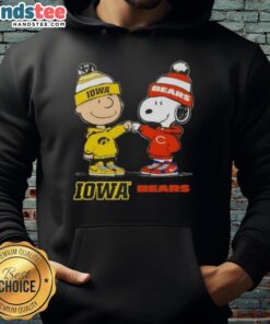 Official Charlie Brown fist bump with Snoopy on Iowa Hawks x Chicago Bears hoodie design, perfect for sports fans.