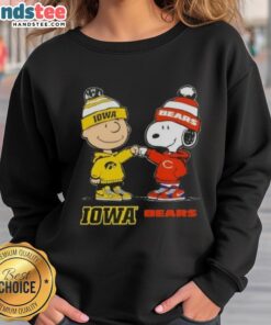 Official Charlie Brown fist bump with Snoopy on Iowa Hawks x Chicago Bears sweatshirt design.