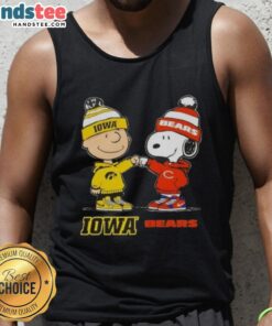 Alt Text: Official Charlie Brown fist bump with Snoopy on Iowa Hawks x Chicago Bears tank top, perfect for fans and collectors.