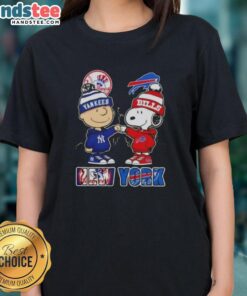 Charlie Brown fist bumping Snoopy with NYC skyline, featuring Yankees and Buffalo Bills logo on a ladies tee.