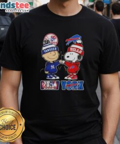 Official Charlie Brown fist bump with Snoopy in NYC sports Yankees and Buffalo Bills skyline t-shirt design.