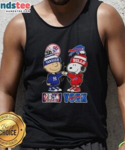 Alt Text: Charlie Brown and Snoopy fist bump in New York City, featuring Yankees and Buffalo Bills skyline on a tank top.