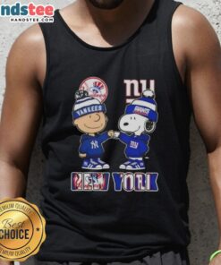 Official Charlie Brown fist bump with Snoopy, NYC skyline, featuring Yankees and Giants, on a stylish tank top.