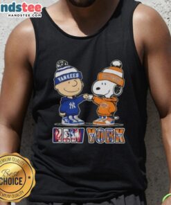 Official Charlie Brown fist bump with Snoopy in New York City sports tank top featuring Yankees and Knicks design.