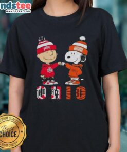 Official Charlie Brown fist bump with Snoopy, featuring Ohio City Sports, Buckeyes, and Cleveland Browns ladies tee design.