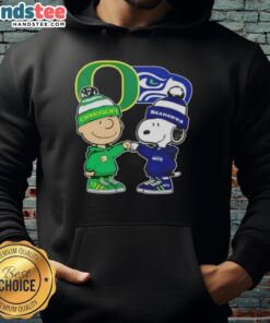 Official Charlie Brown Fist Bump Snoopy Oregon Ducks X Seattle Seahawks Hoodie featuring vibrant graphics and cozy design.
