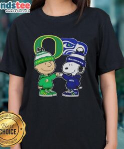 Alt Text: Official Charlie Brown fist bump with Snoopy on Oregon Ducks x Seattle Seahawks ladies tee shirt design.
