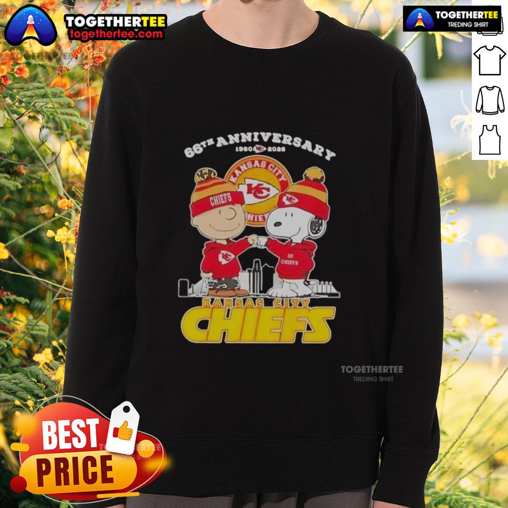 Official Charlie Brown Touch Hand Snoopy X Kansas City Chiefs 66th Anniversary 1960 2026 Skyline Sweatshirt Official Charlie Brown Touch Hand Snoopy x Kansas City Chiefs sweatshirt celebrating 66th anniversary 1960-2026 skyline design.