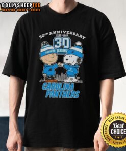Alt Text: Official Charlie Brown X Snoopy 30th Anniversary T-Shirt featuring Carolina Panthers skyline design, 1995-2025.