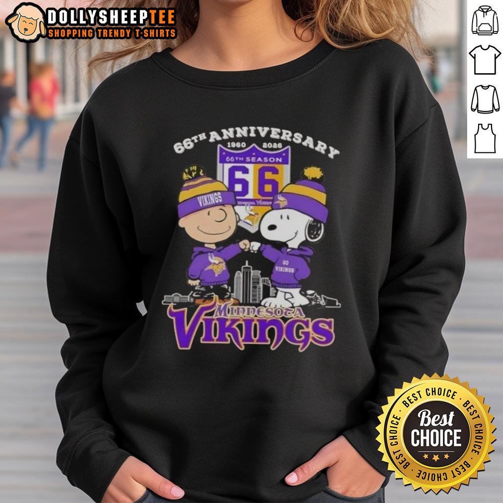 Official Charlie Brown X Snoopy 66th Anniversary 1960 2026 Minnesota Vikings Skyline Sweatshirt Alt Text: Official Charlie Brown x Snoopy 66th Anniversary sweatshirt featuring Minnesota Vikings skyline design, 1960-2026.