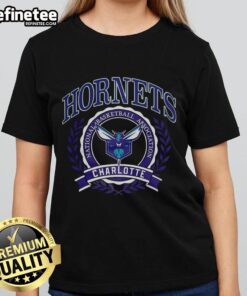 Alt Text: Official Charlotte Hornets NBA logo in a laurel wreath frame on a retro ladies tee, perfect for basketball fans.