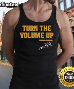 Alt Text: Official Donald Trump Turn The Volume Up signature tank top featuring bold graphics and a patriotic design.