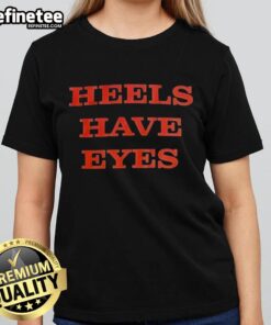Official Heels Have Eyes Ladies Tee showcasing a stylish design, perfect for fashion-forward women.
