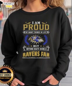 Baltimore Ravens fan sweatshirt with the phrase 'I am proud of many things in life, but nothing beats being a Ravens fan.'