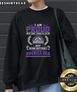 Cozy sweatshirt featuring 'I Am Proud Of Many Things In Life But Nothing Beats Being A Colorado Rockies Fan' design.