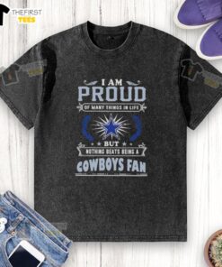 Washed T-shirt with 'I Am Proud Of Many Things In Life, But Nothing Beats Being A Dallas Cowboys Fan' slogan.