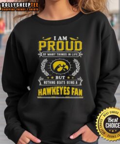 Iowa Hawkeyes fan sweatshirt featuring 'I Am Proud Of Many Things In Life' slogan, perfect for game day apparel.