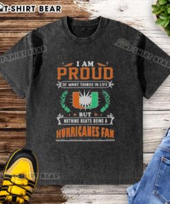 Miami Hurricanes fan proudly wearing a washed t-shirt that celebrates their love for football and team spirit.