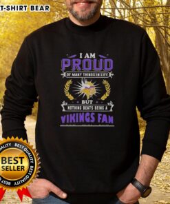 Cozy Minnesota Vikings fan sweatshirt with 'I Am Proud Of Many Things In Life' text, perfect for game day and team spirit.