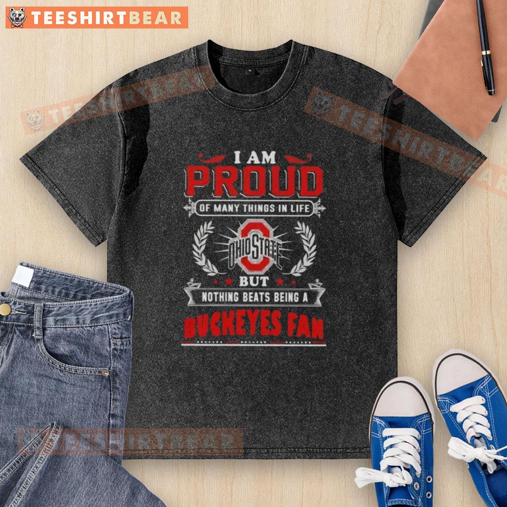 official-i-am-proud-of-many-things-in-life-but-nothing-beats-being-a-ohio-state-buckeyes-fan-washed-t-shirt Alt Text: Ohio State Buckeyes fan washed t-shirt showcases pride with 'I Am Proud Of Many Things' slogan.