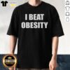 Official I Beat Obesity T-Shirt featuring a bold slogan promoting health and wellness, perfect for fitness enthusiasts.