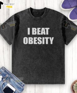 Official I Beat Obesity washed t-shirt featuring motivational design, perfect for fitness enthusiasts and healthy lifestyle advocates.
