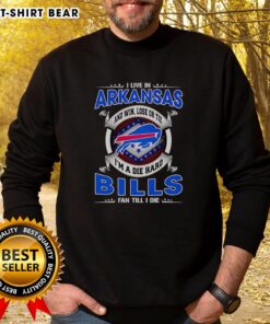 Buffalo Bills fan sweatshirt with 'I Live in Arkansas and I'm a Dead Hard Fan' slogan, perfect for game day pride.