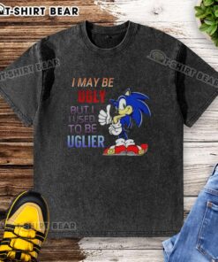 Cartoon hedgehog on washed T-shirt with 'I May Be Ugly But I Used To Be Uglier' slogan, perfect for quirky fashion.