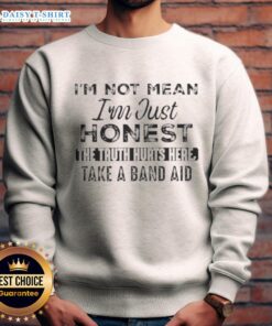 Alt Text: Comfortable sweatshirt featuring 'I'm Not Mean, I'm Just Honest' quote, perfect for casual wear and expressing honesty.