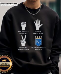 Alt Text: Cozy Official Kansas City Royals sweatshirt featuring Nothing Beats Rock, Paper, Scissors graphic design.