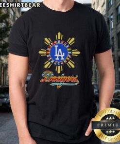 Alt Text: Official Los Angeles Dodgers X Hispanic T-Shirt featuring vibrant colors and team logo, perfect for fans and collectors.