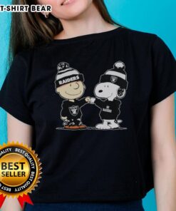 Alt Text: Official Los Angeles Raiders Snoopy and Charlie Brown Best Friends Ladies Tee featuring playful cartoon design.
