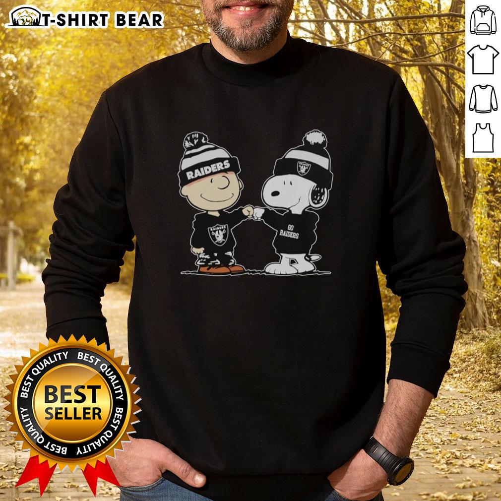 Official Los Angeles Raiders Snoopy And Charlie Brown Best Friends Sweatshirt Alt Text: Official Los Angeles Raiders Snoopy and Charlie Brown Best Friends Sweatshirt featuring iconic characters in team colors.