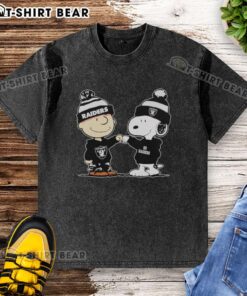 Official Los Angeles Raiders Snoopy and Charlie Brown Best Friends washed t-shirt featuring iconic cartoon characters.